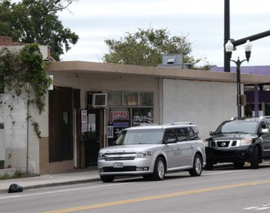 Circa 1991. 644 West Church Street. A popular building on the corner of Church Street and Parramore Avenue houses the J. Henry Barber Shop, where you can get “The Best Cuts”. During the 60’s and decades after other businesses that occupied space in the building included a fish market, sundae shop, Soul Train Music Record Shop and Re-Runz Records. J. Henry Barber Shop c. 1991