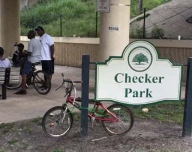 Circa 1973. 619 South Parramore Avenue. The “Park” consisted of a series of permanently placed checkers tables under the East West Expressway (408) overpass. The City of Orlando constructed the park after the local residents started hanging out enjoying the shade under the overpass. The park became a landmark for players and residents to relax and talk “trash” in a game of checkers. Checker Park c. 1973