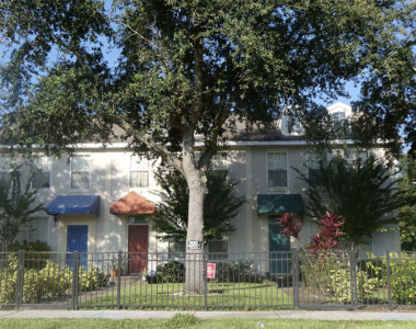 The demand for single family homeownership led to this contemporary condo complex built in the 1990’s. Here shotgun elements took on massive scale of using stucco on the exterior, one roof serving multiple units and housing multi-level structures with attached enclosed garages. The historic Gabriel Jones House once occupied the property.