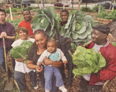Circa 2009. Parramore’s Community Garden generates pride and food. The residents showing off the broad leafy vegetables grown in the garden.