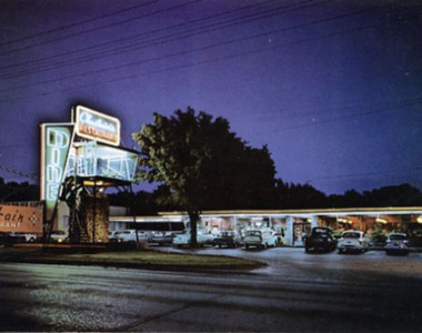 Circa 1960. Chastain’s Restaurant. 23 North Orange Blossom Trail. The restaurant’s solan was “Serving Good Food For Fine People”. In the parking lot, was a two-story lighted glass booth with a spiral staircase. The booth served as a DJ booth.